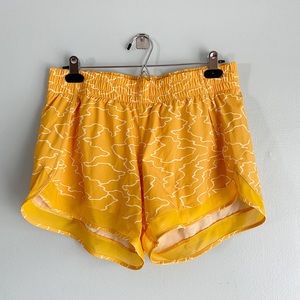 Athleta Mesh Racer Run Shorts 4”, size M